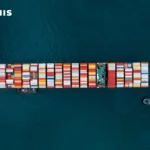 Aerial view of cargo ship transporting agricultural commodities with Terraviis IoT logistics tracking.