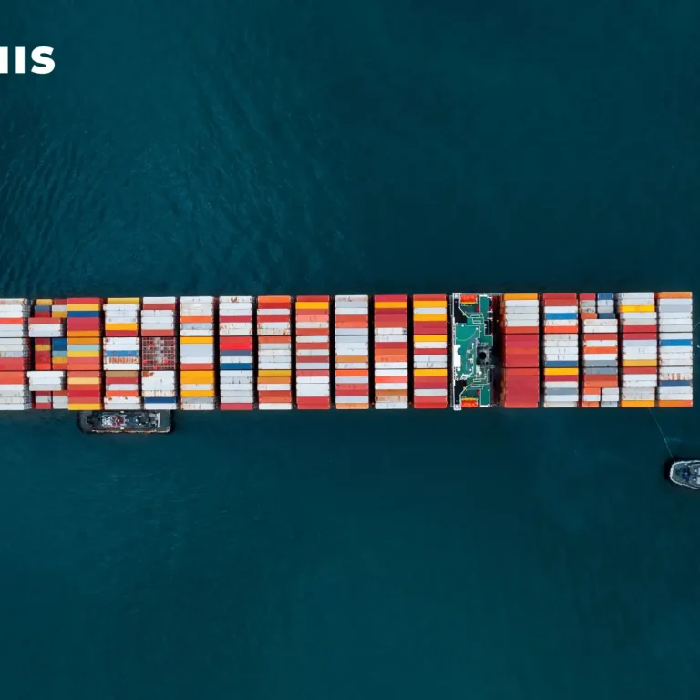 Aerial view of cargo ship transporting agricultural commodities with Terraviis IoT logistics tracking.